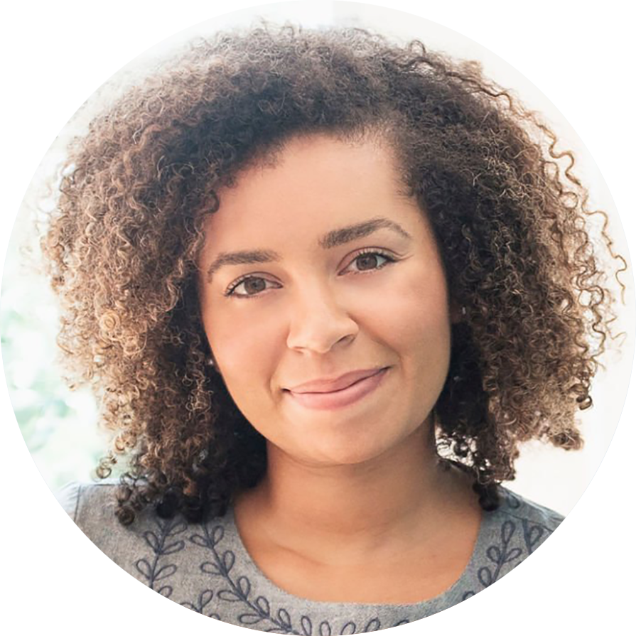 profile shot of a woman with curly hair